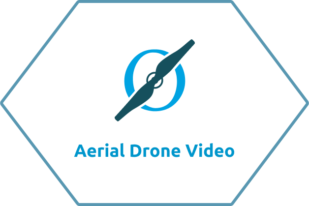 white hexagon with text that says aerial drone video and an icon of a plane propeller